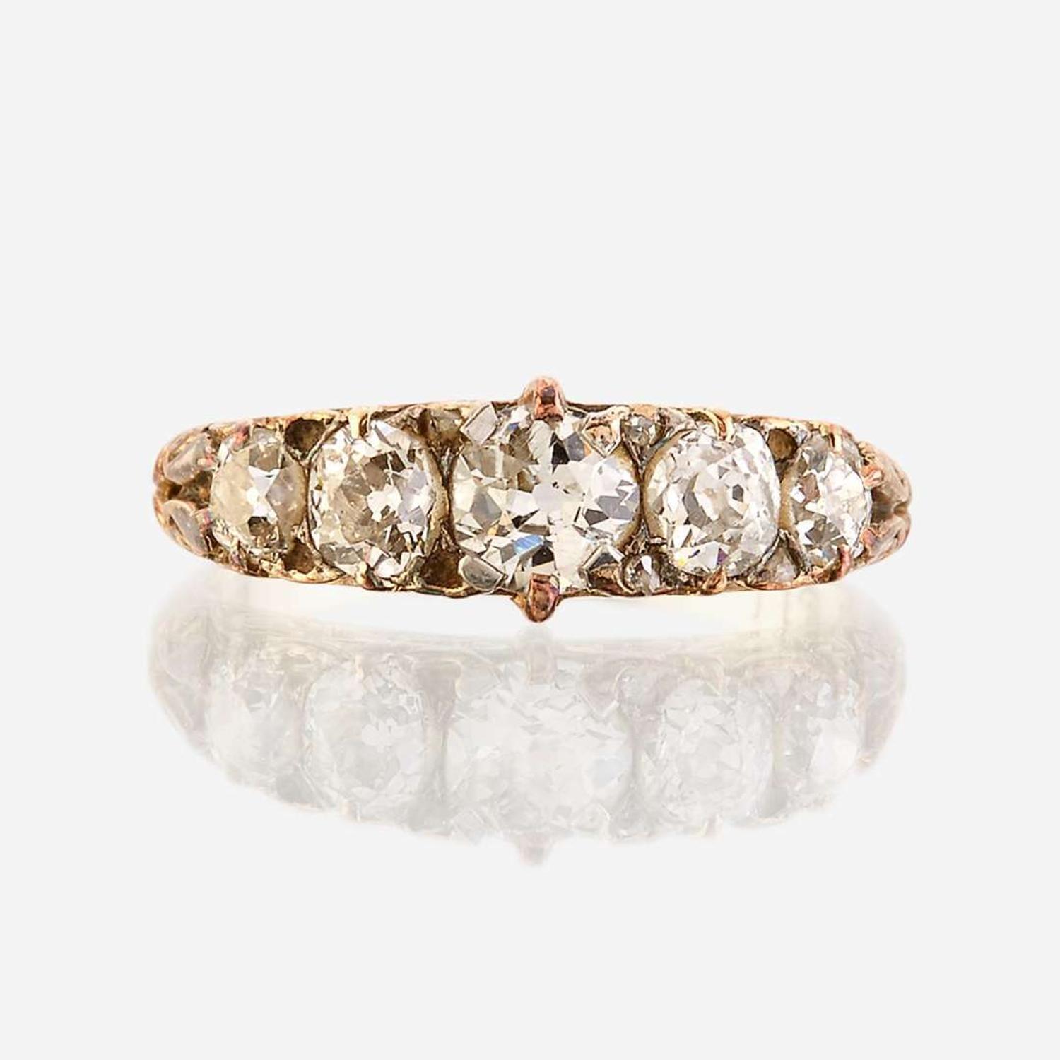 An antique diamond and eighteen karat gold ring
