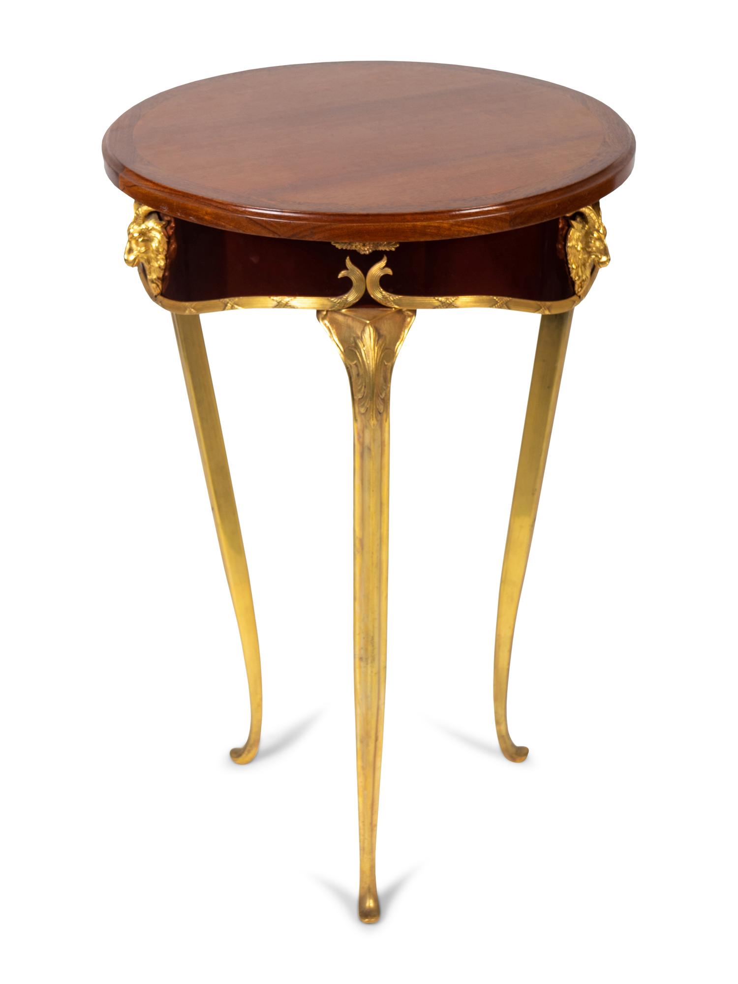 A French Empire Style Gilt Metal Mounted Mahogany Top Side Table — 20TH CENTURY