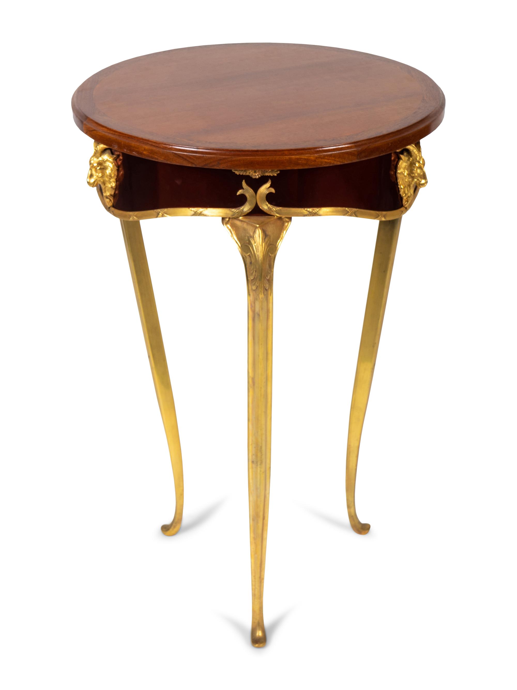 A French Empire Style Gilt Metal Mounted Mahogany Top Side Table — 20TH CENTURY