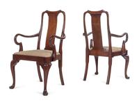 A Set of Seven Queen Anne Style Mahogany Dining Chairs