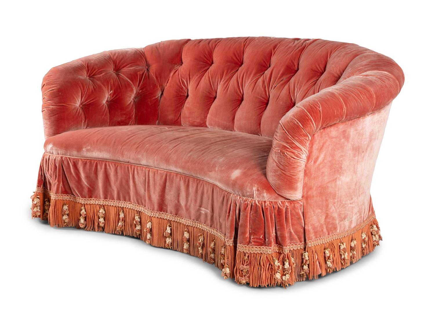 A Button-Tufted Velvet Reniform Sofa