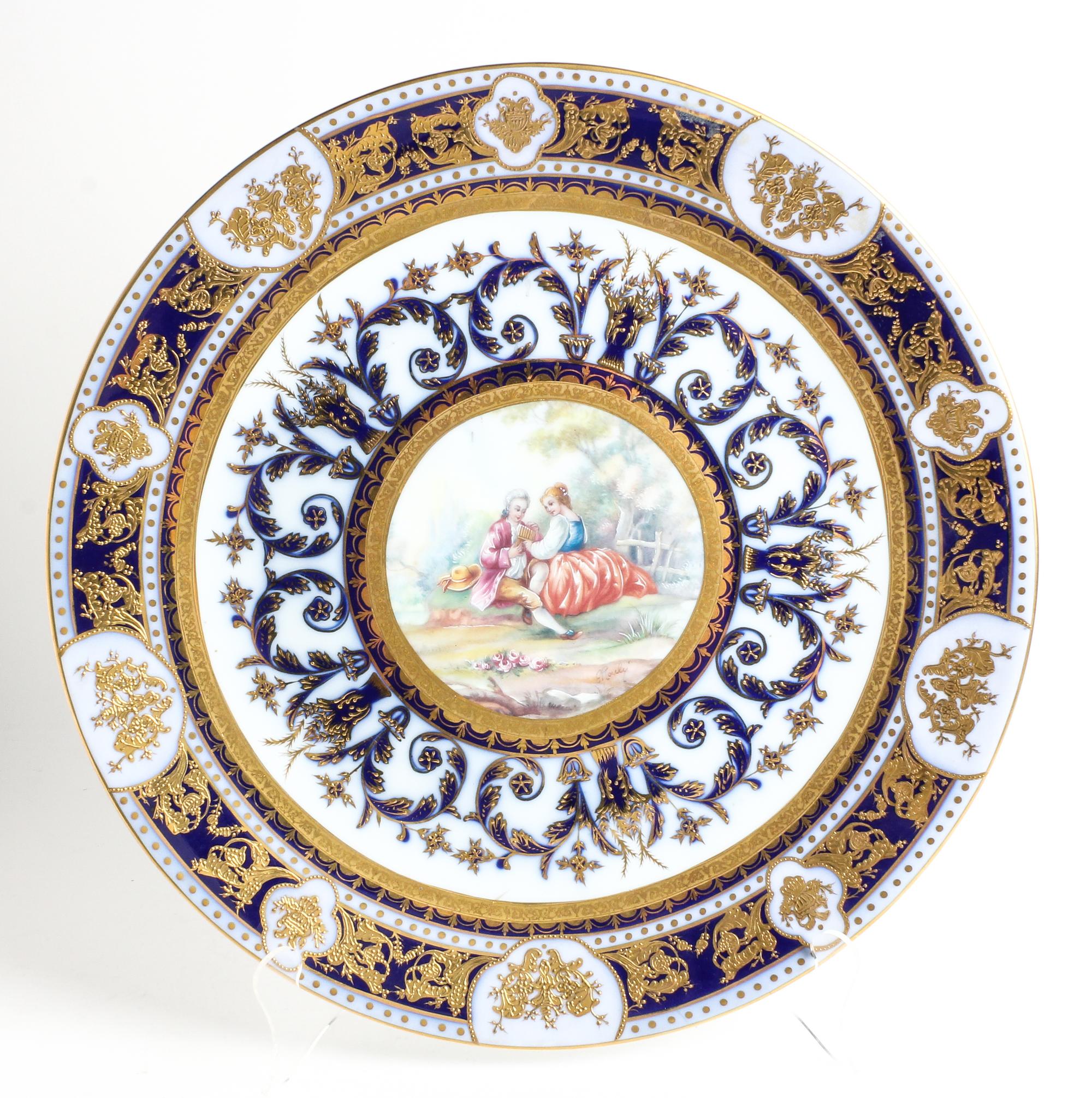 A German Polychrome and Parcel Gilt Porcelain Charger Diameter 16 3/4 inches. — SPURIOUS KPM MARK ON UNDERSIDE, 20TH CENTURY