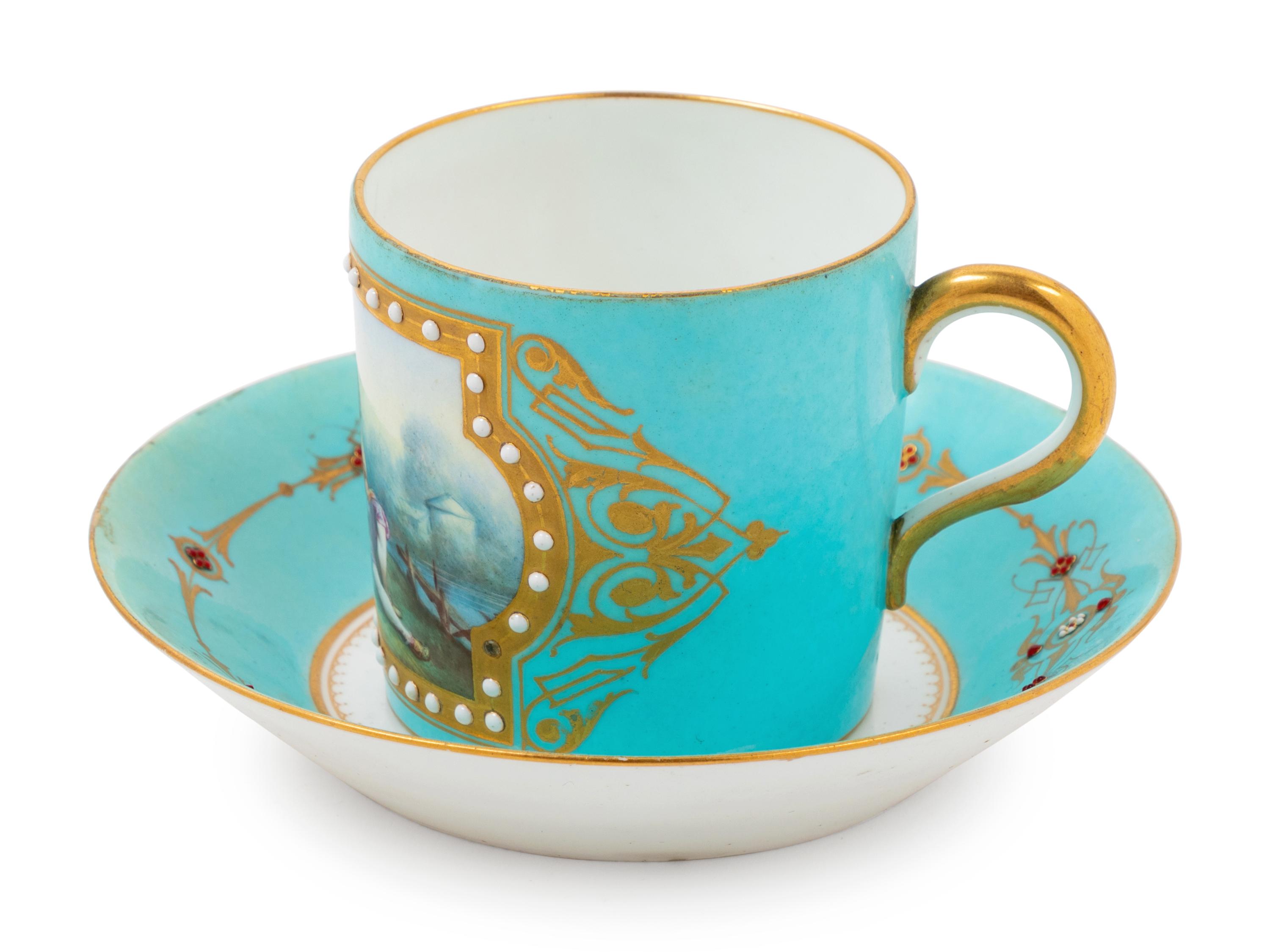 A Sèvres Style "Jeweled" Porcelain Cup and Saucer