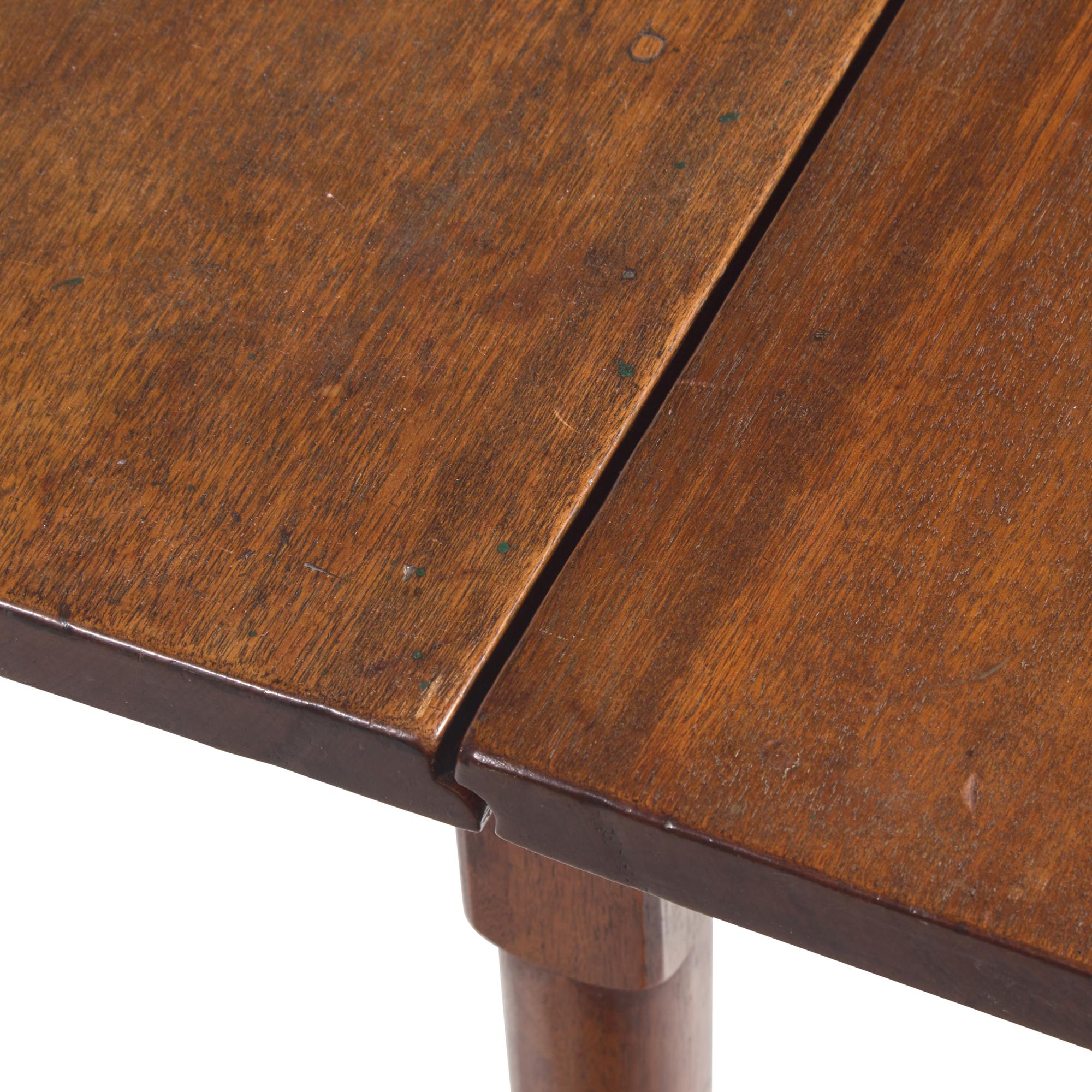 A Queen Anne Walnut Drop-Leaf Table