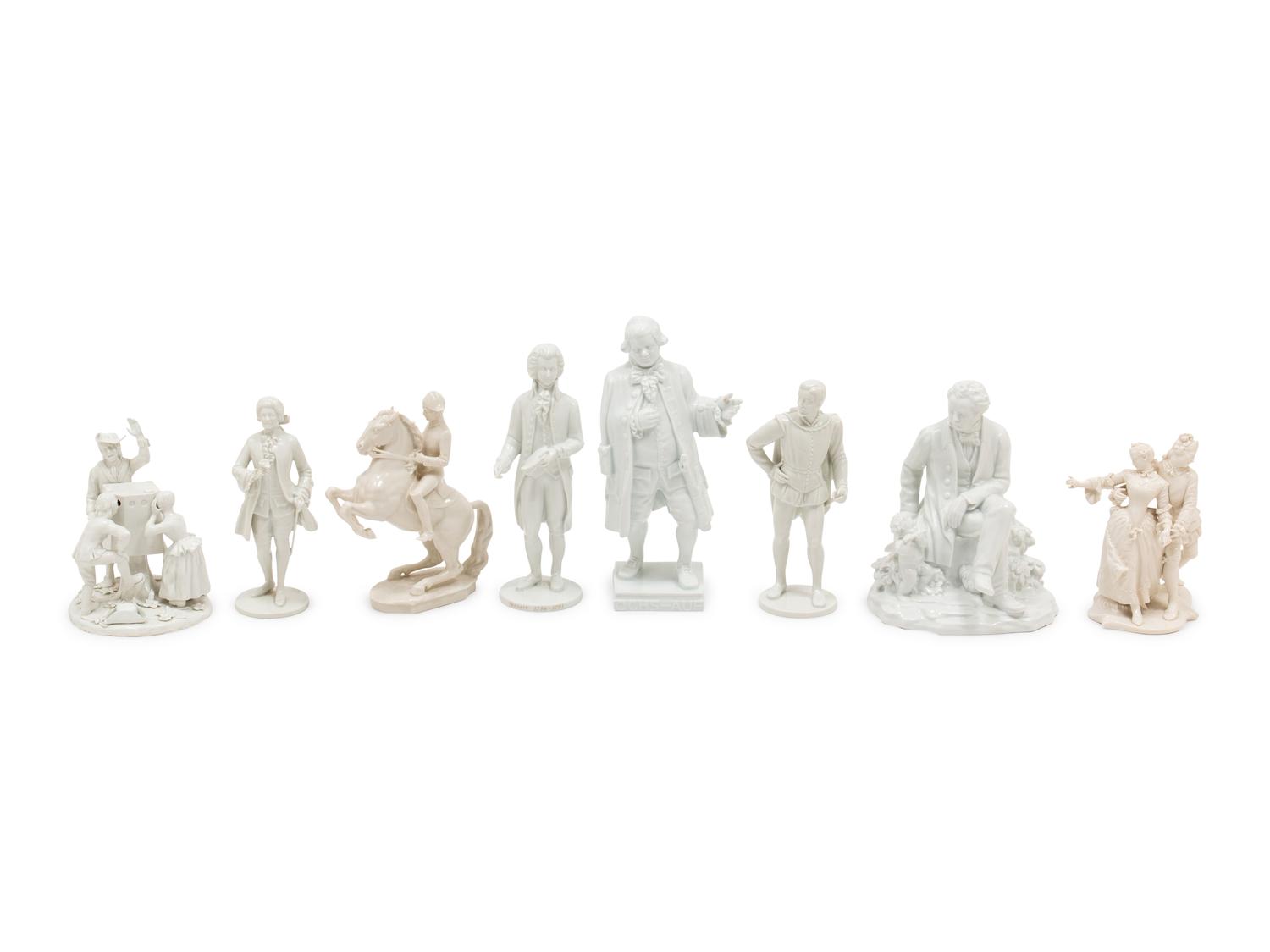 Eight Continental White-Glazed Porcelain Figures