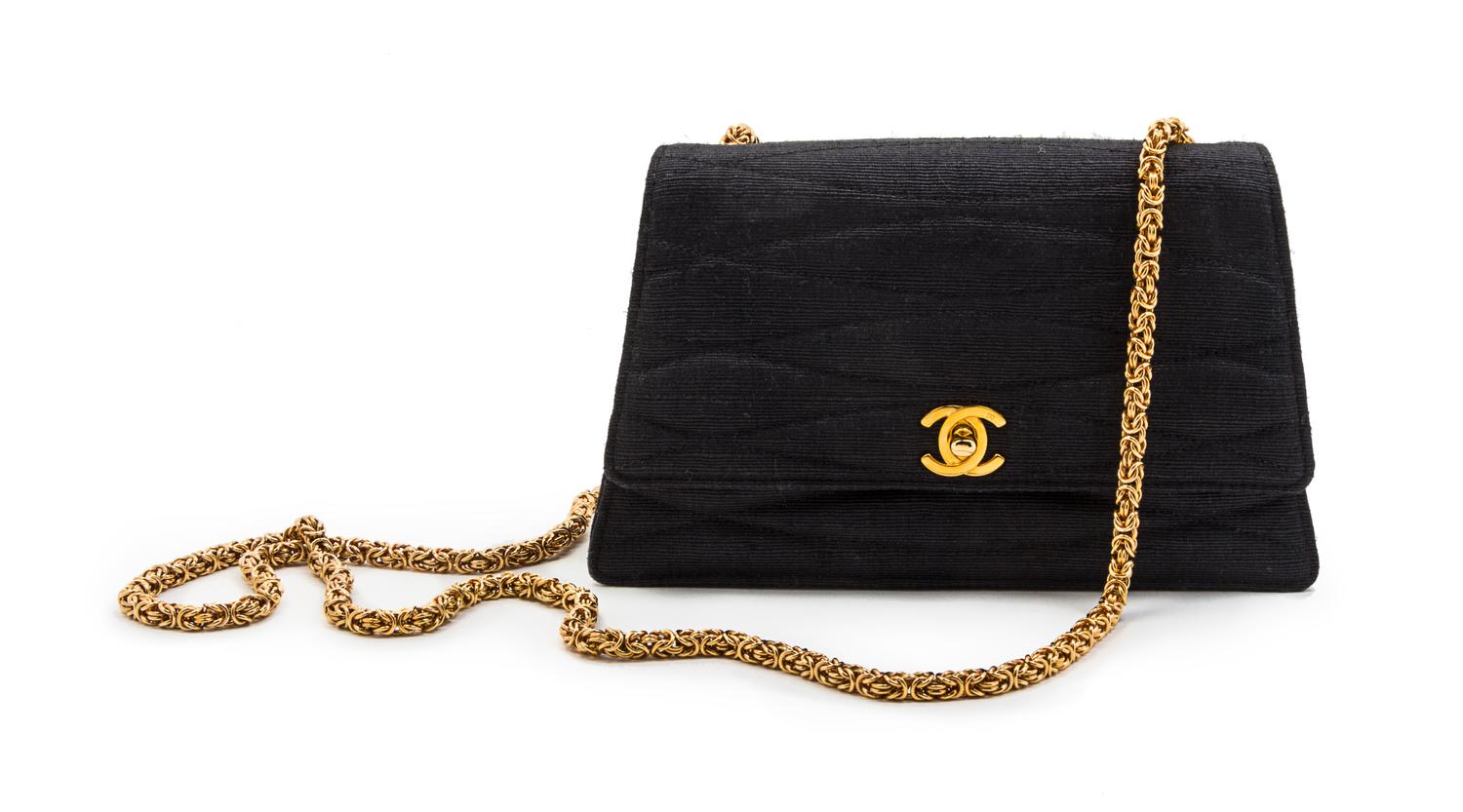 A Chanel Grey Quilted Woven Flap Bag, 8 x 5 x 2 inches.