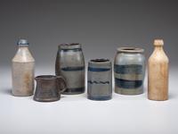 Five Stoneware Bottles and Canning Jars