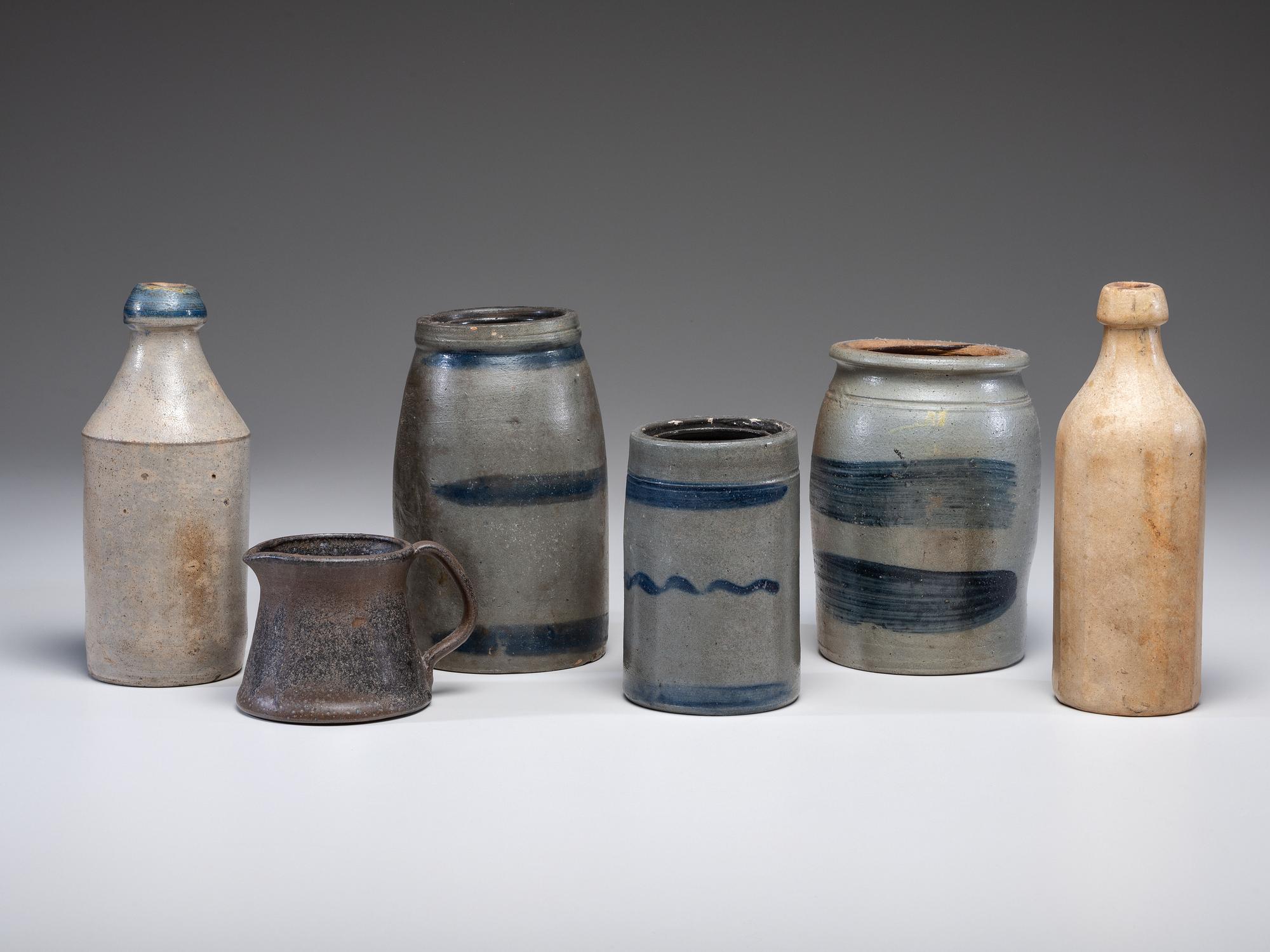 Five Stoneware Bottles and Canning Jars