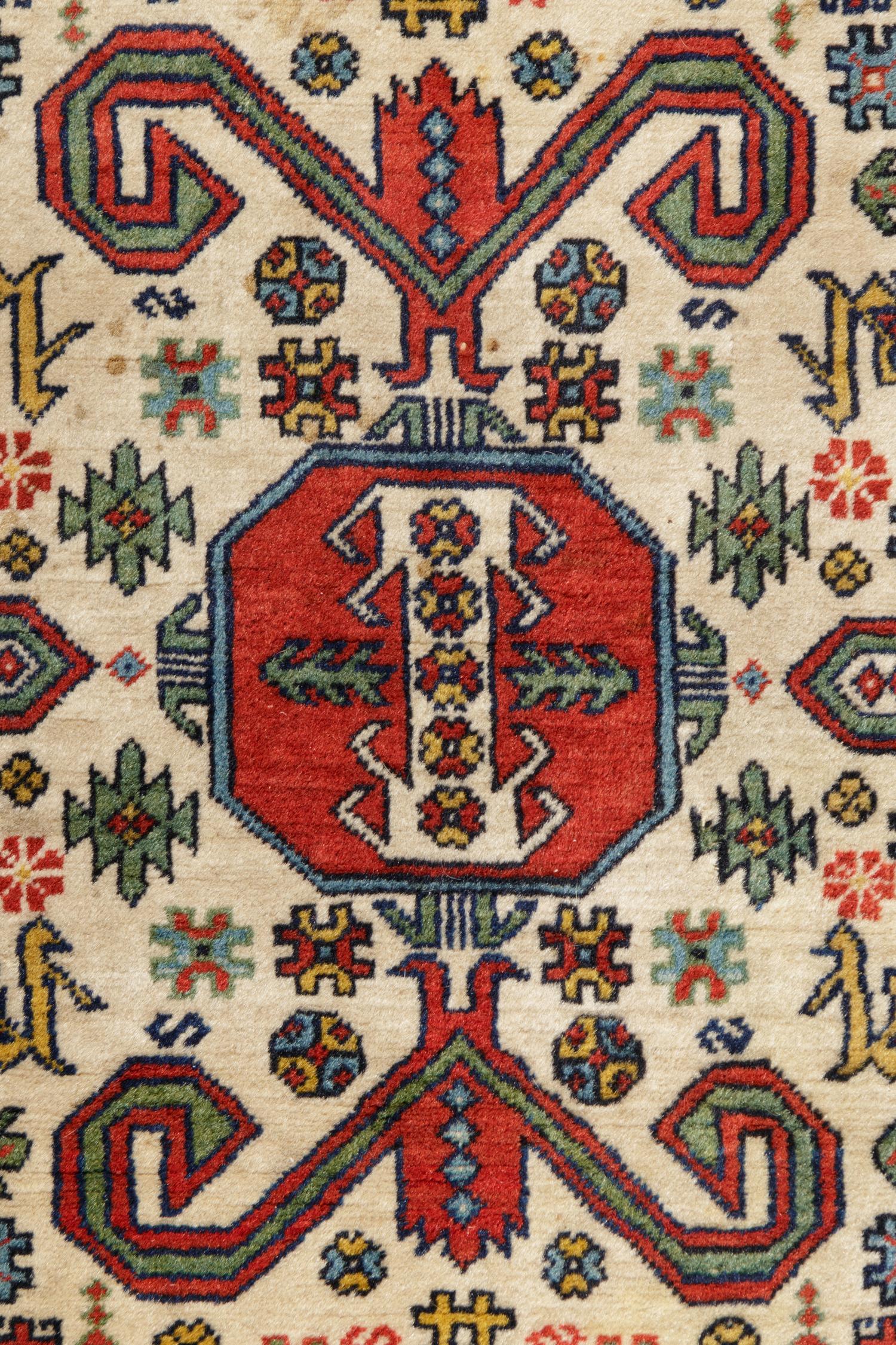 A Perepedil Ivory-Ground Wool Rug