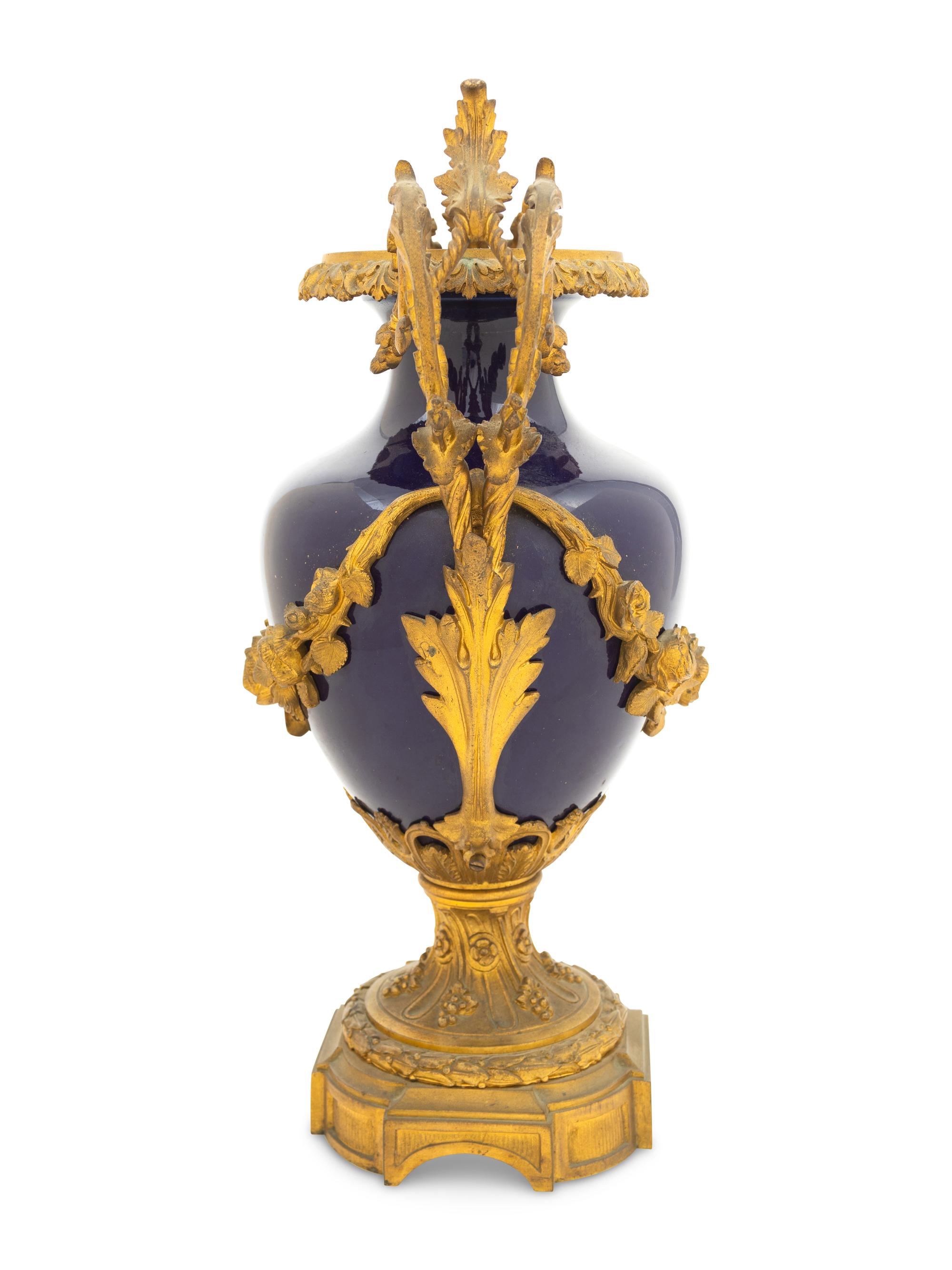 A Sèvres Style Gilt Bronze Mounted Porcelain Urn