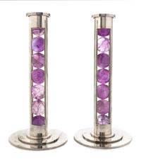A Pair of Elizabeth II Silver and Amethyst Candlesticks, Paul Belvoir, London, 2007, each of cylindrical column form enclosing seven am