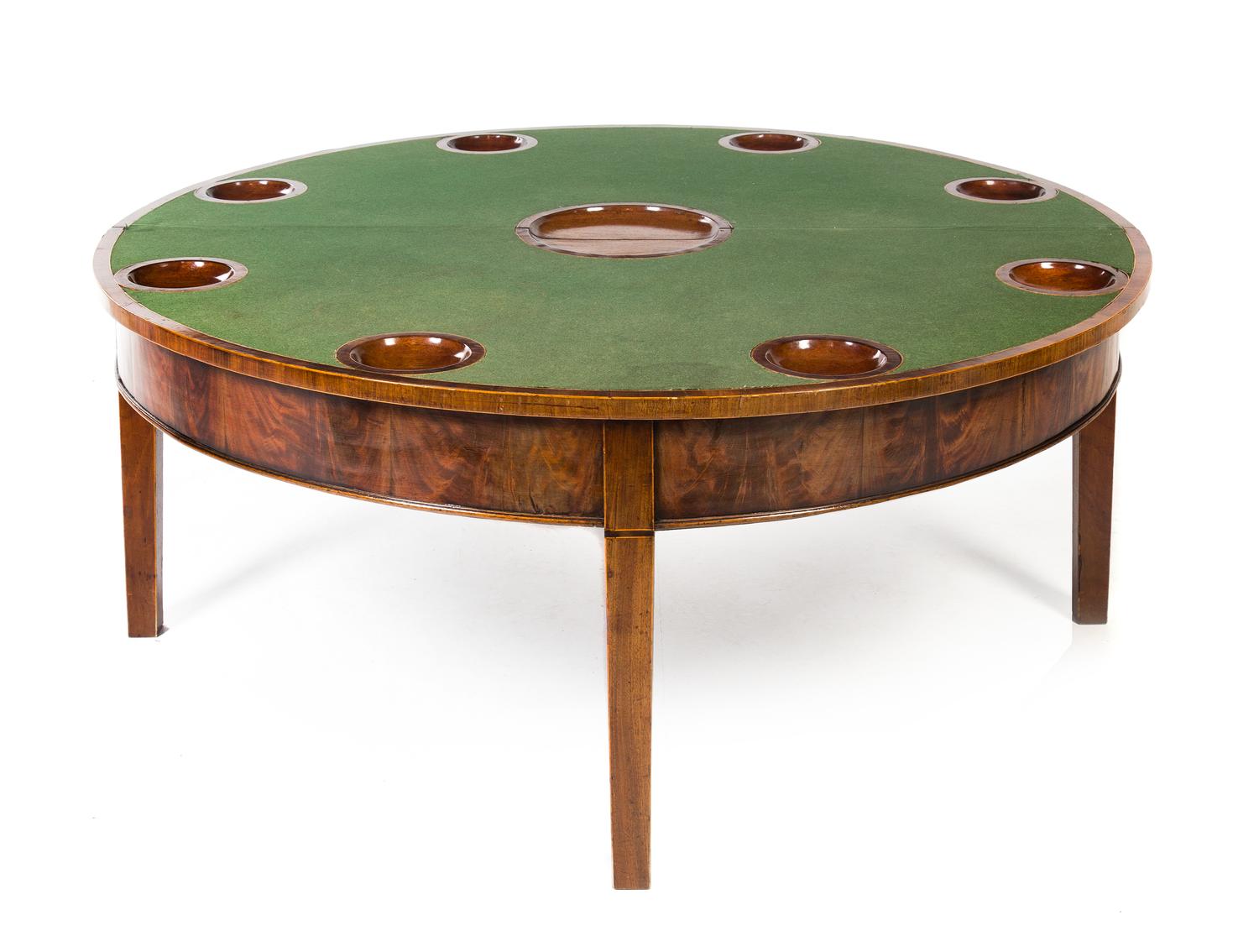 A George III Mahogany Flip-Top Low Game Table Height 19 x diameter of top 46 inches. — 19TH CENTURY