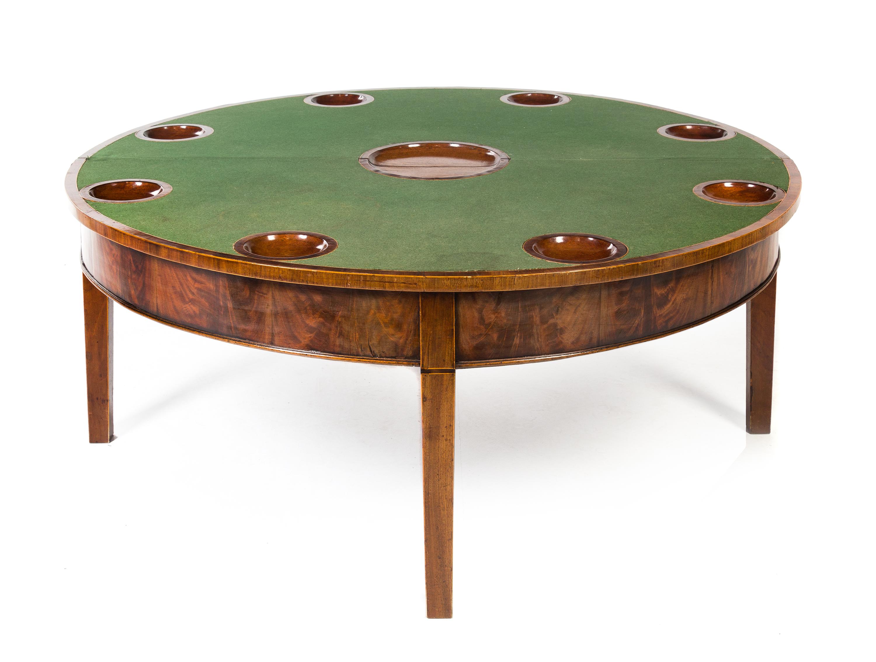 A George III Mahogany Flip-Top Low Game Table Height 19 x diameter of top 46 inches. — 19TH CENTURY