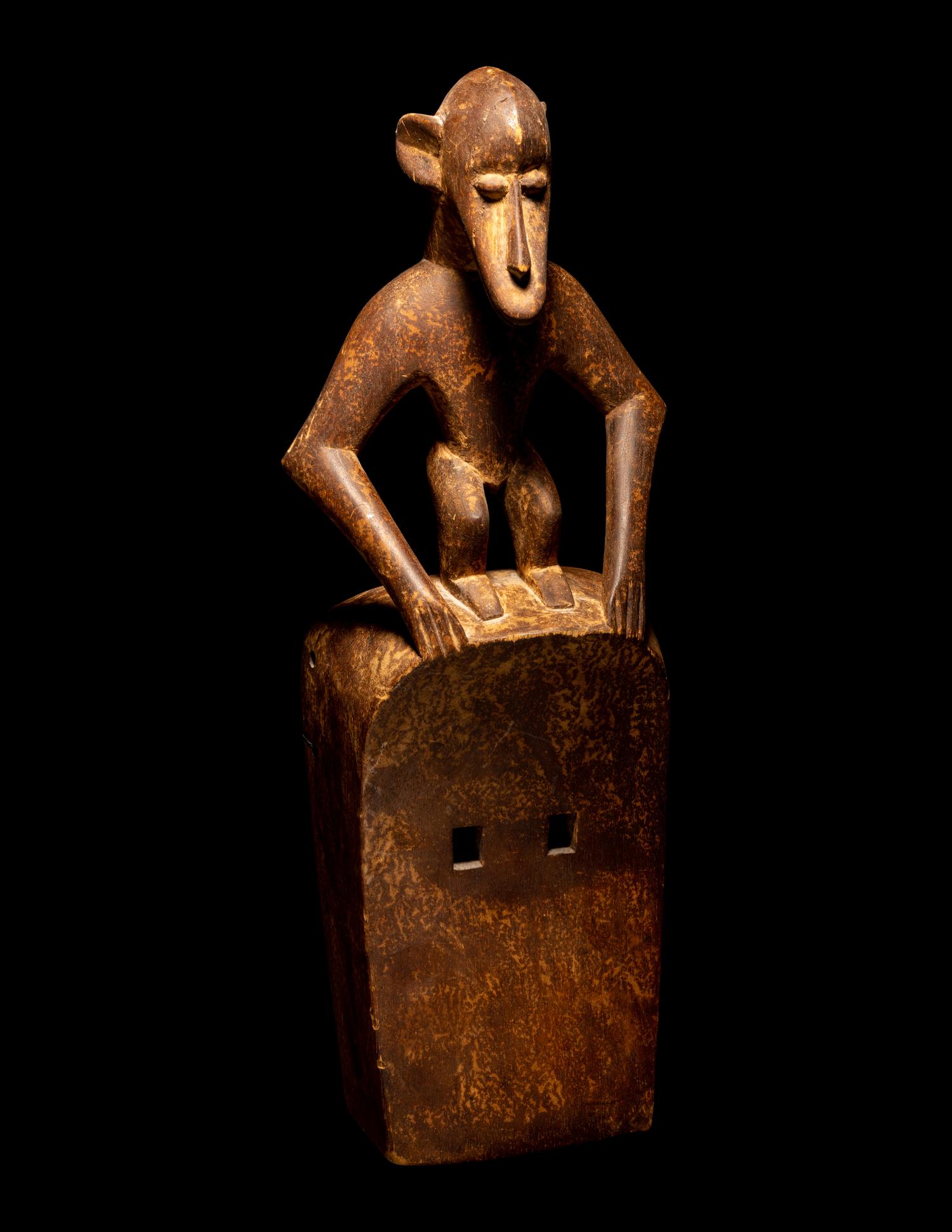 Two Dogon Wood Masks with Figures