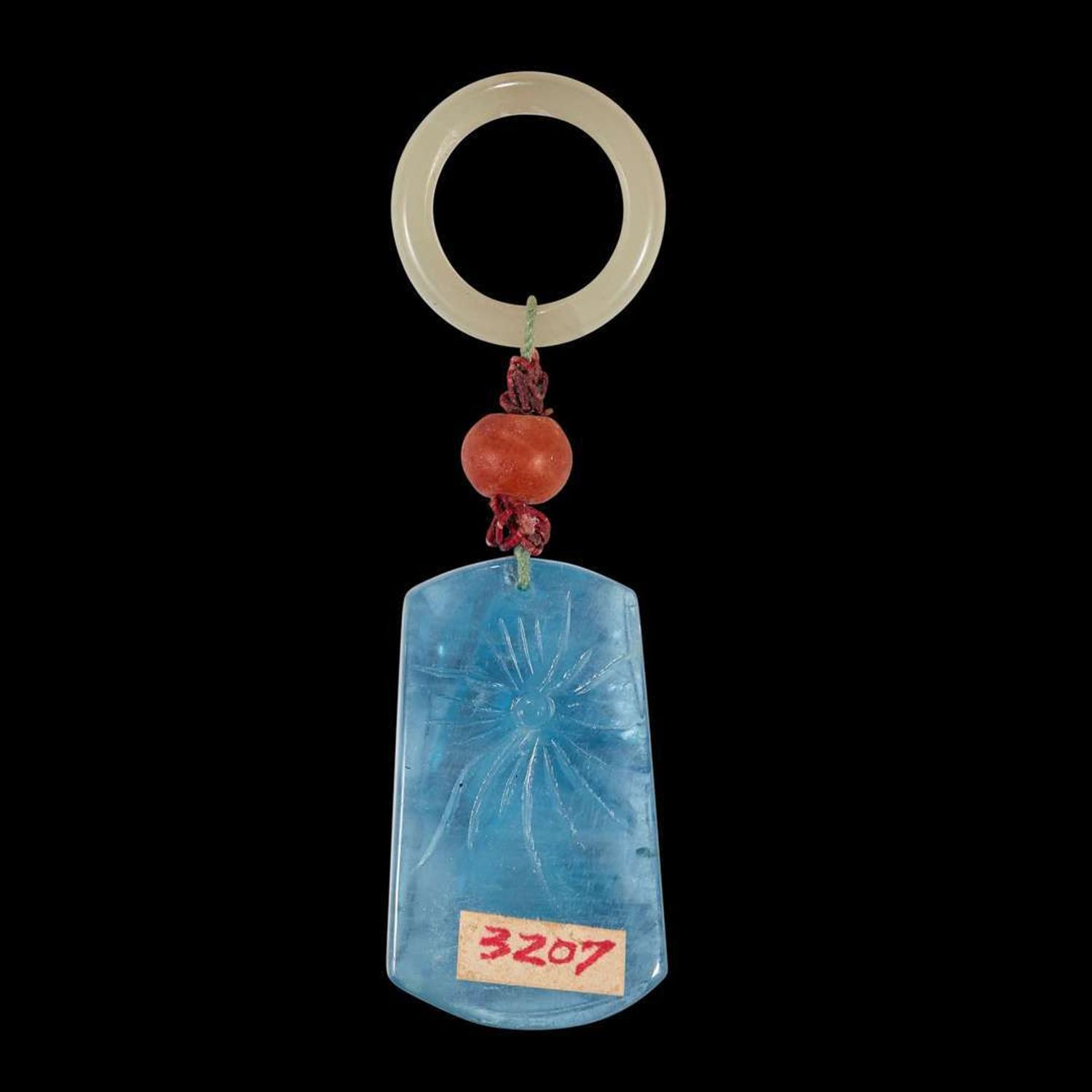 A Chinese carved aquamarine pendant