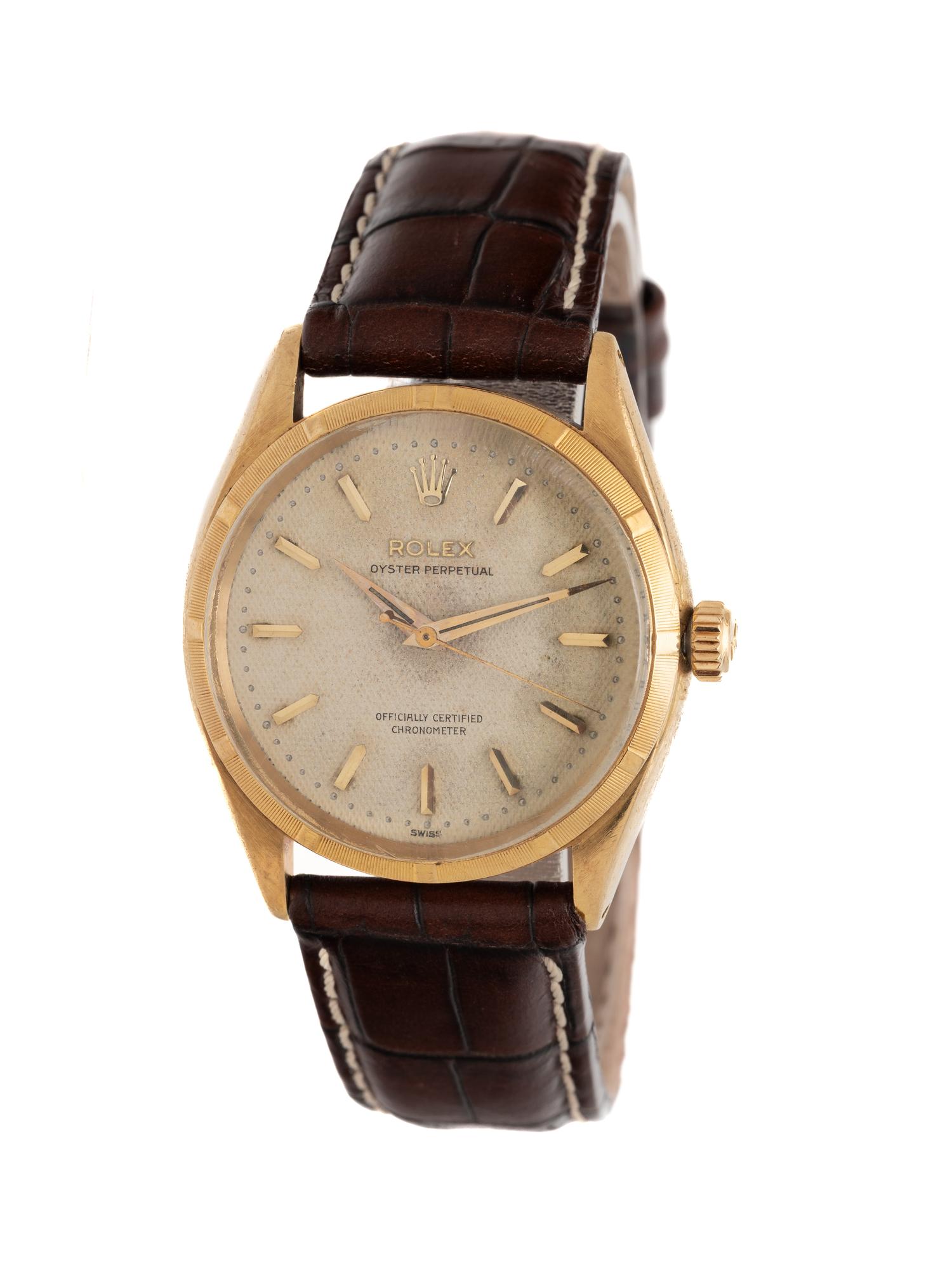 ROLEX, REF. 6565, 18K YELLOW GOLD VINTAGE 'OYSTER PERPETUAL ' WATCH WITH HONEYCOMB DIAL, CIRCA 1956