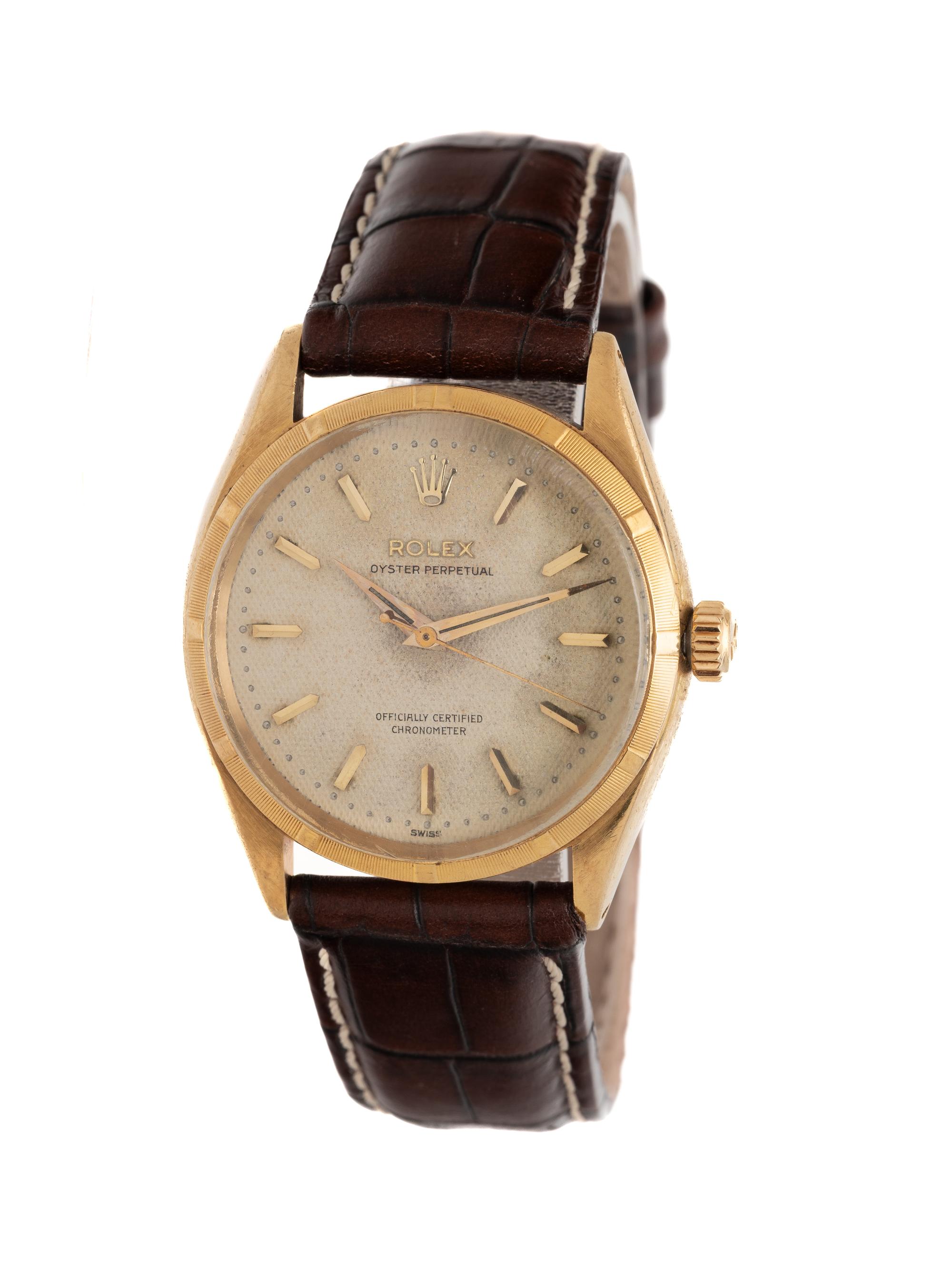 ROLEX, REF. 6565, 18K YELLOW GOLD VINTAGE 'OYSTER PERPETUAL ' WATCH WITH HONEYCOMB DIAL, CIRCA 1956