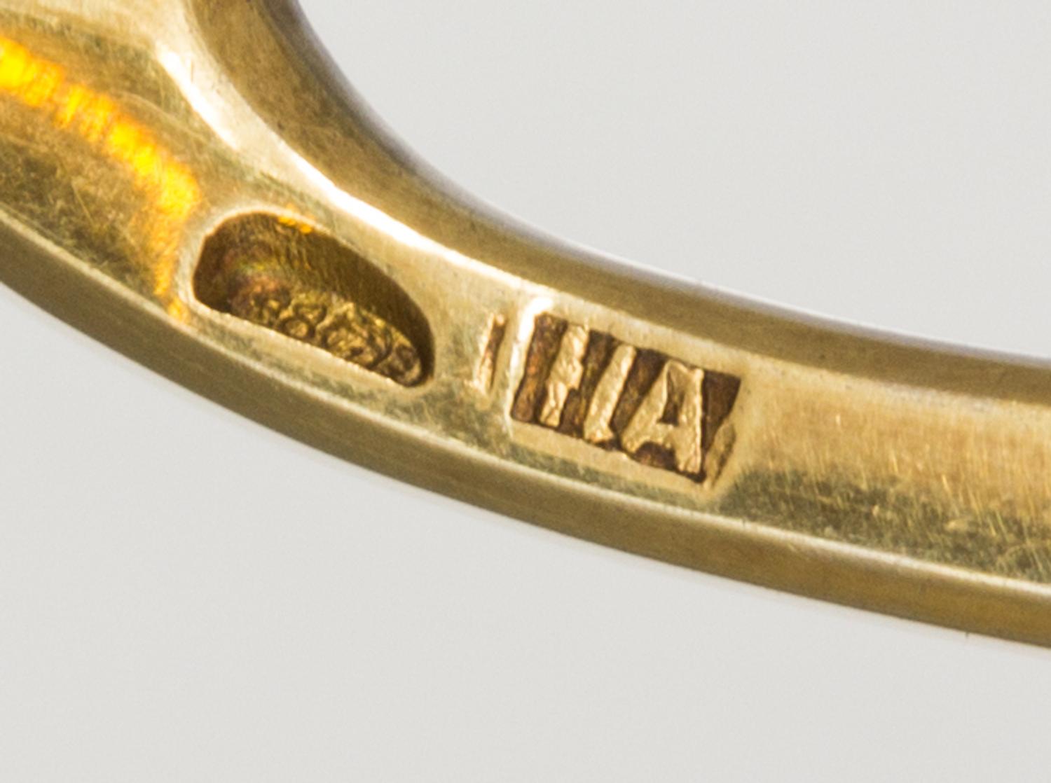 A Russian Silver-Gilt and Enamel Spoon, Mark of 11th Artel, Moscow, early 20th century, having a spherical finial on a twist handle, th