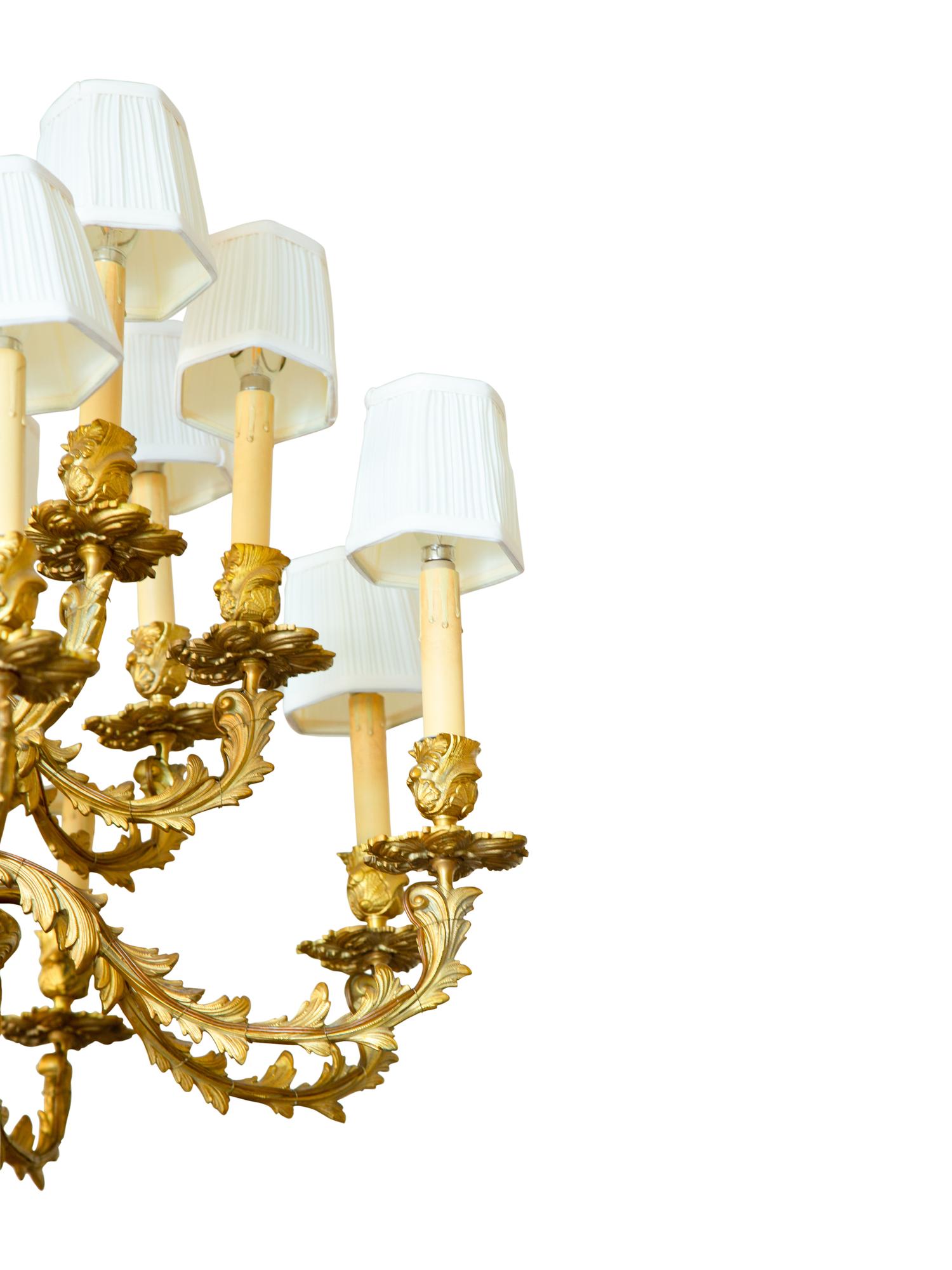 A Louis XV Style Gilt Bronze Sixteen-Light Chandelier