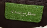 A Christian Dior Rasta Zipper Saddle Handbag, 10" x 7" x 2".