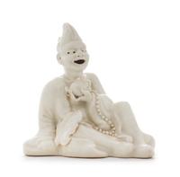A White Glazed Porcelain Figure of an Immortal — REPUBLIC PERIOD