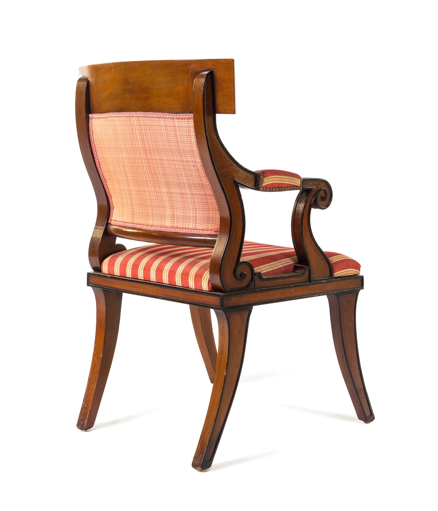 A Set of Sixteen Regency Style Parcel Ebonized Mahogany Dining Chairs