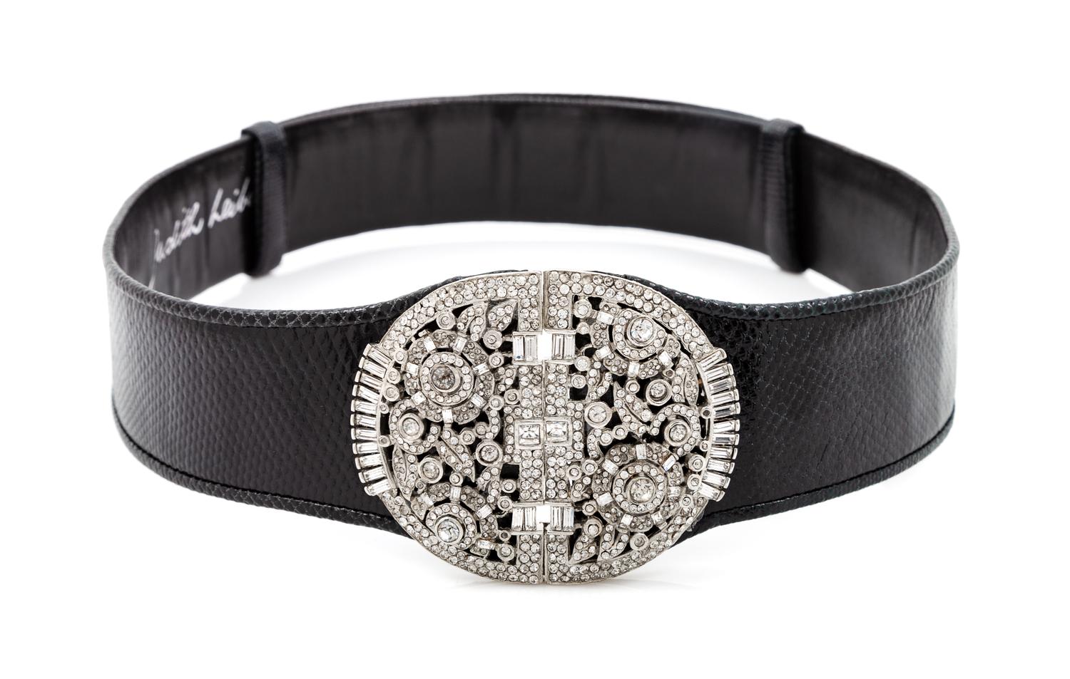 A Judith Leiber Black Snakeskin Belt, 24"- 34" x 1.75".