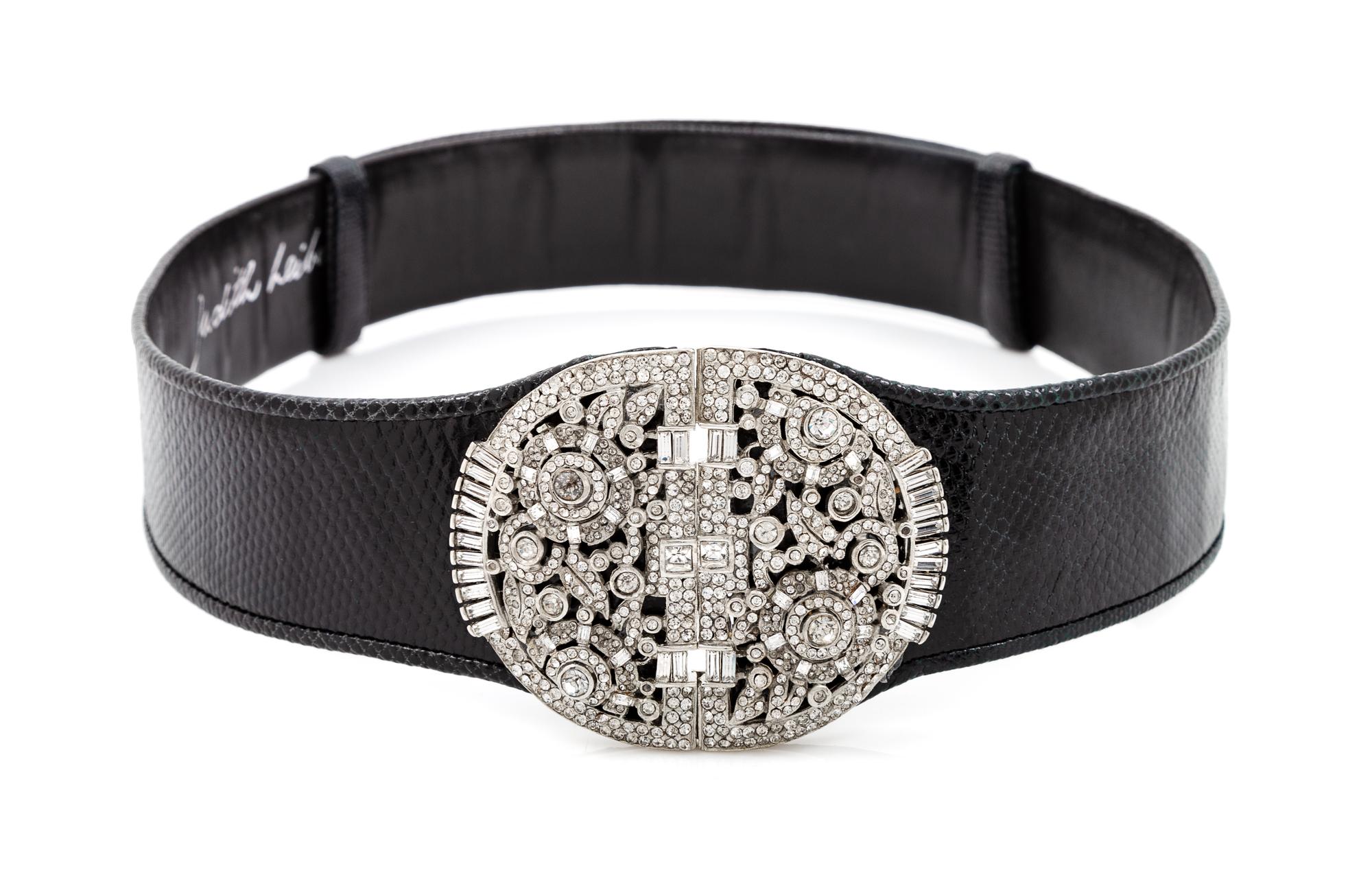 A Judith Leiber Black Snakeskin Belt, 24"- 34" x 1.75".