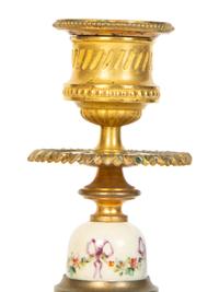 A Pair of French Gilt Bronze and Painted Porcelain Candlesticks