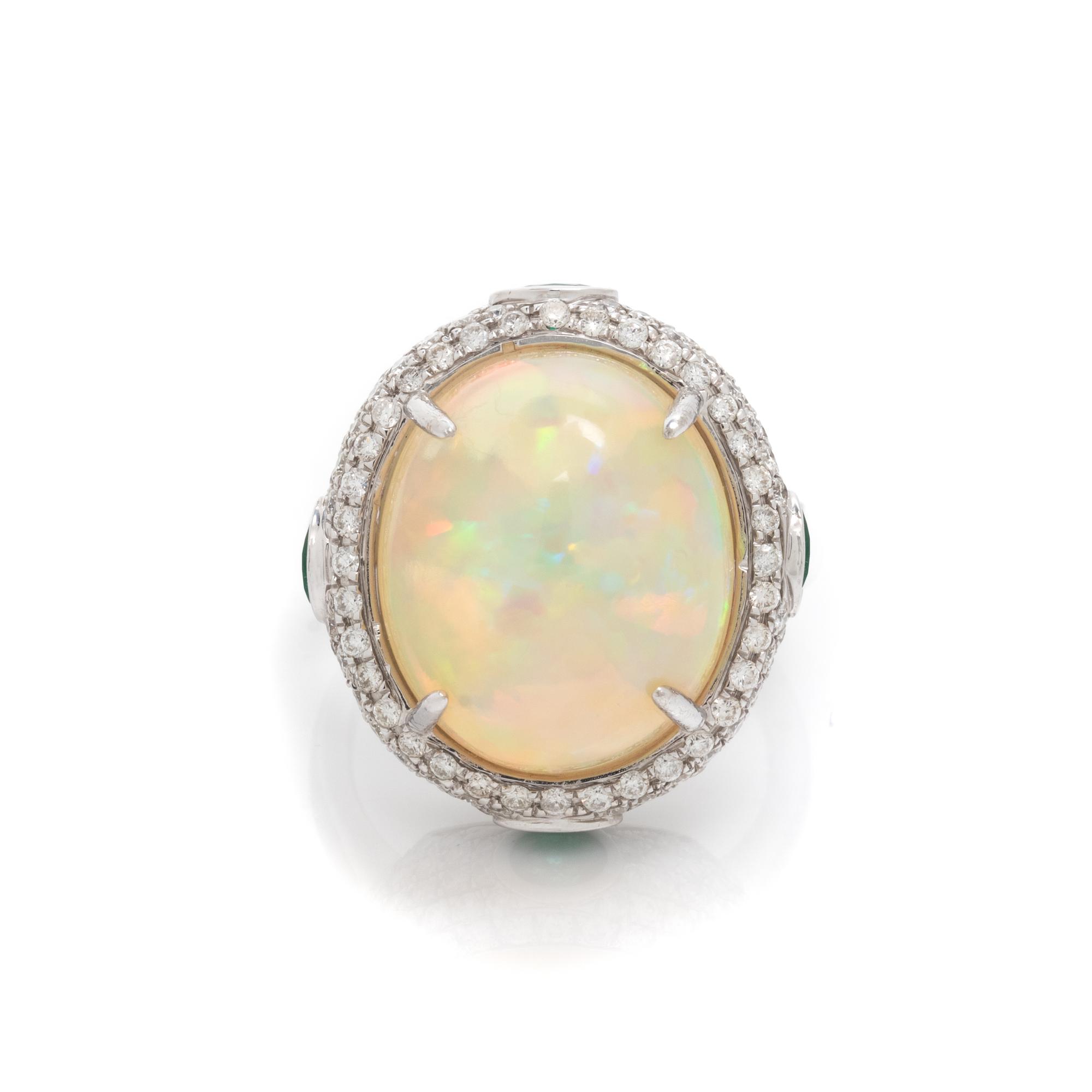OPAL, DIAMOND AND EMERALD RING