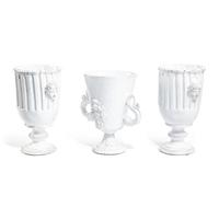 Three White Glazed Earthenware Vases