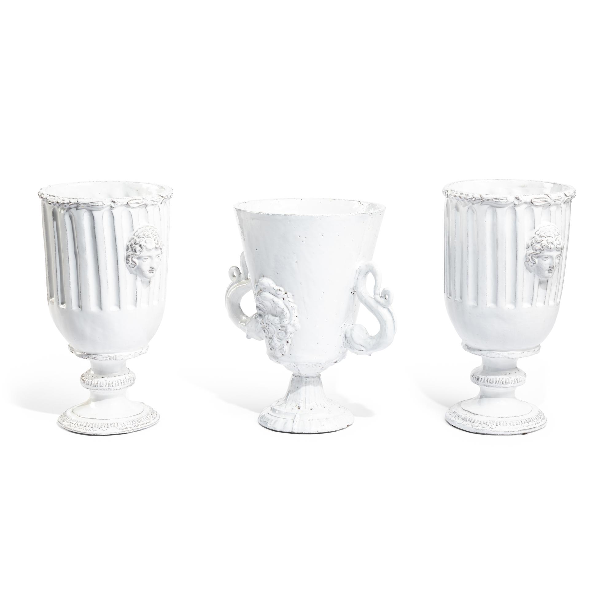 Three White Glazed Earthenware Vases