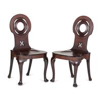 A Pair of English Carved Mahogany Side Chairs