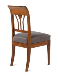 An Austrian Neoclassical Burlwood Writing Table and Chair