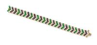 An 18 Karat Yellow Gold, Diamond, Sapphire, and Emerald Bracelet, 30.90 dwts.