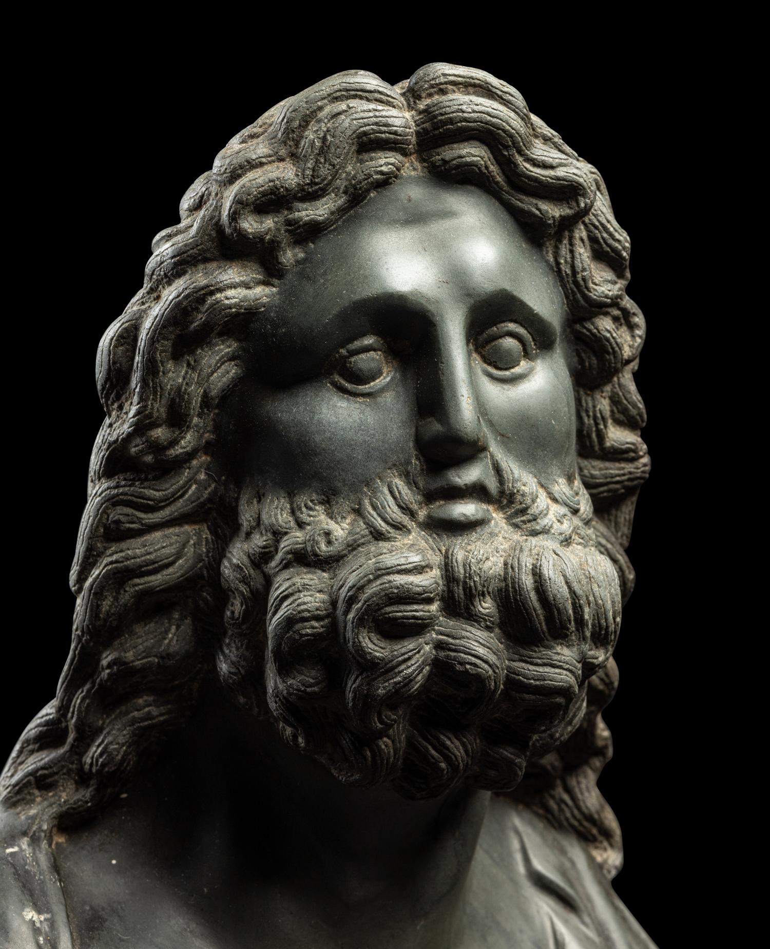 A Roman Green Schist Bust of Jupiter