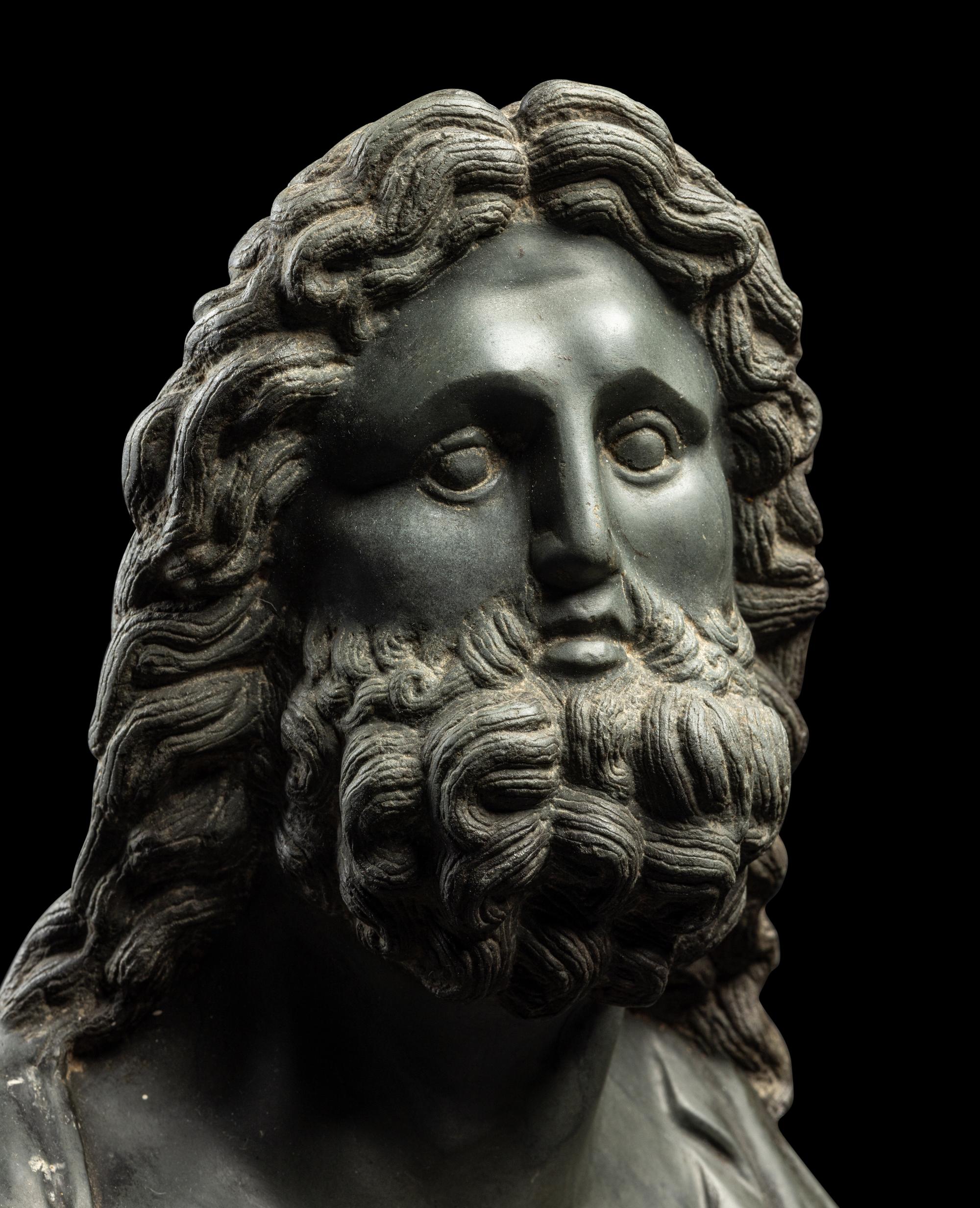 A Roman Green Schist Bust of Jupiter