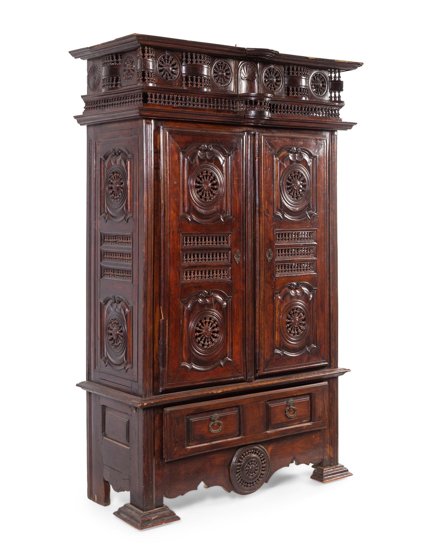 A Brittany Style Carved Walnut Armoire