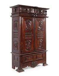 A Brittany Style Carved Walnut Armoire