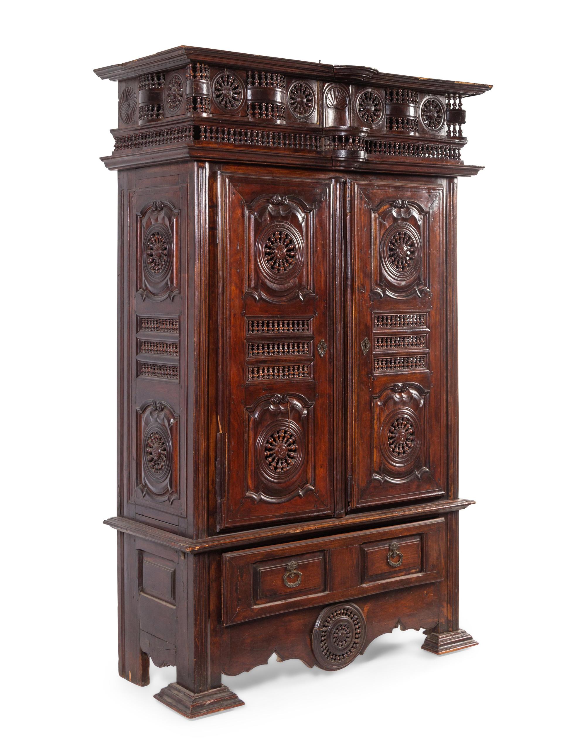 A Brittany Style Carved Walnut Armoire
