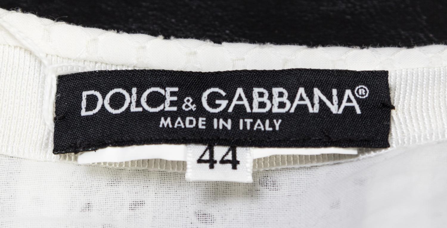 A Dolce & Gabbana White Eyelet Pleated Skirt, Size 44.