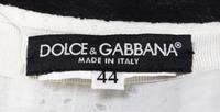 A Dolce & Gabbana White Eyelet Pleated Skirt, Size 44.