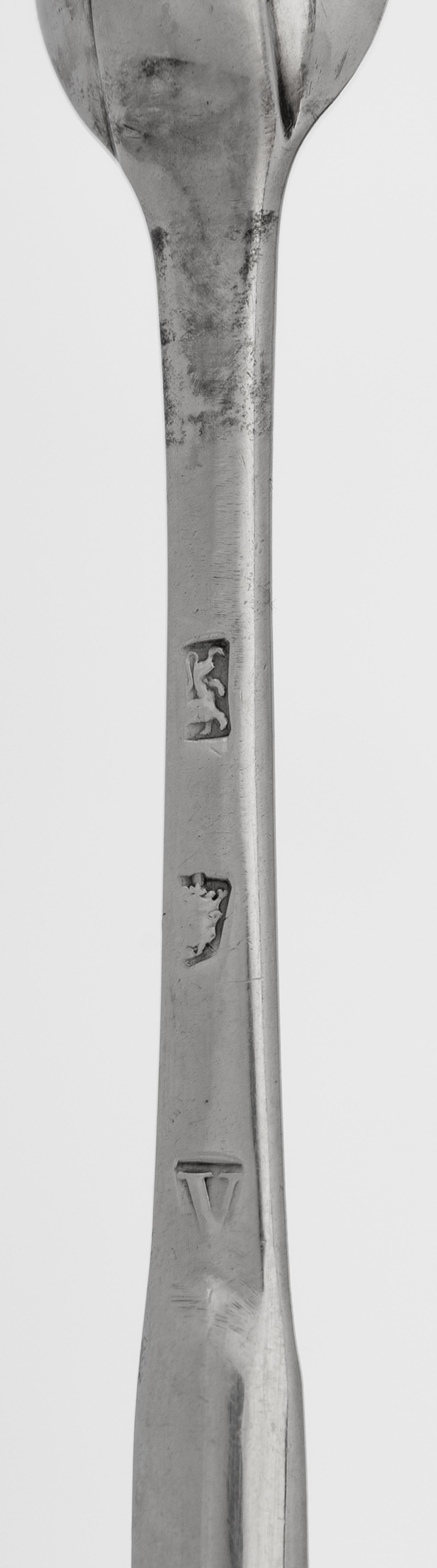 A Group of Four Georgian Silver Marrow Scoops