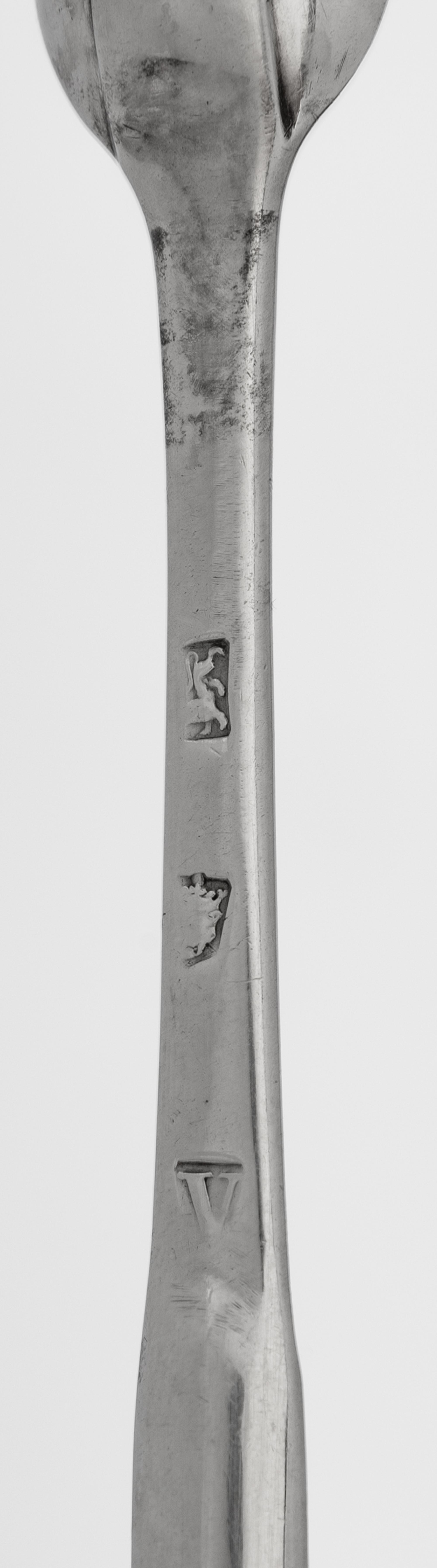 A Group of Four Georgian Silver Marrow Scoops