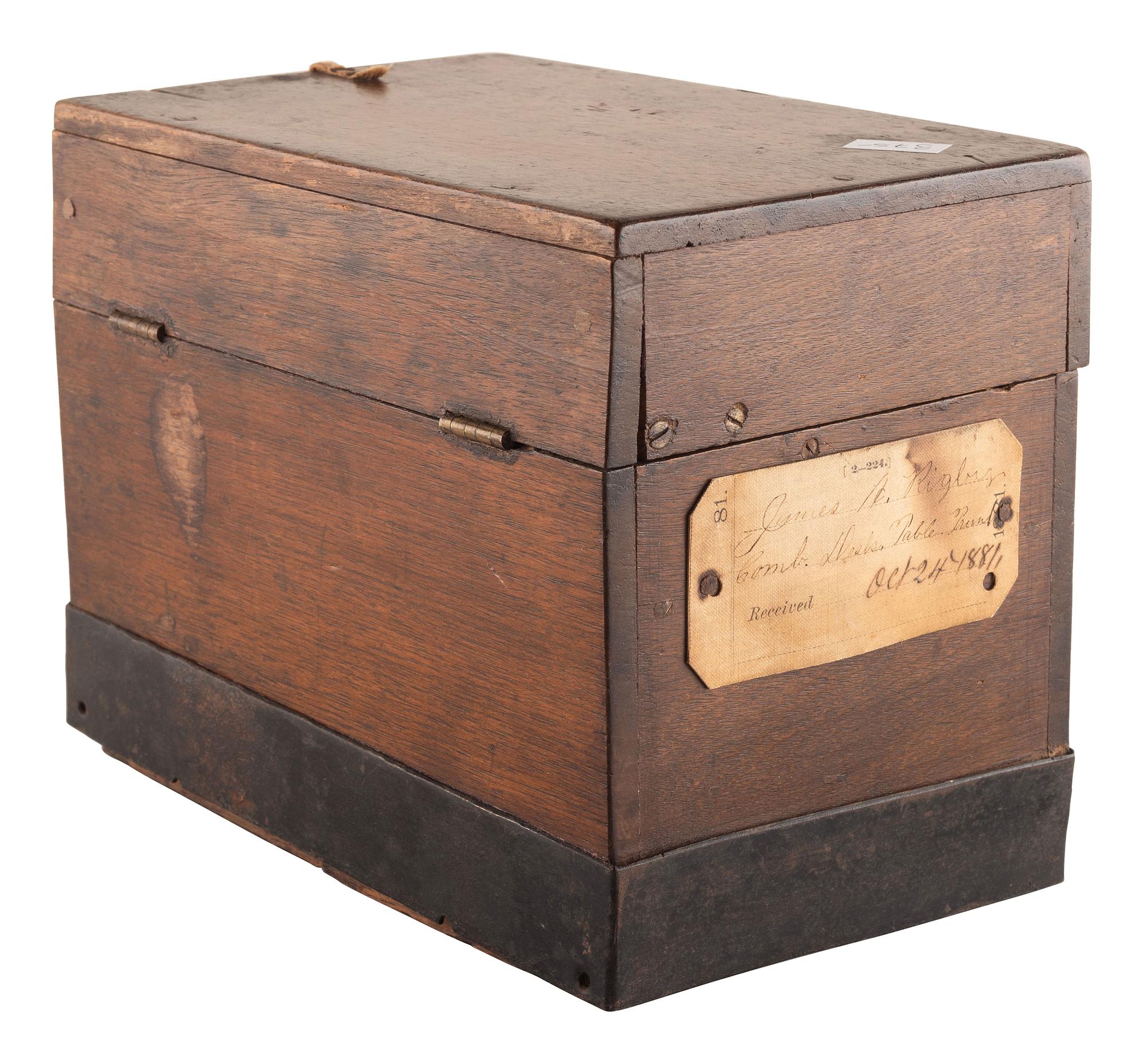 [SCIENCE & TECHNOLOGY]. James A. Rigby patent model for a "Combined Trunk, Desk, Table &c." with original tags, 1882.