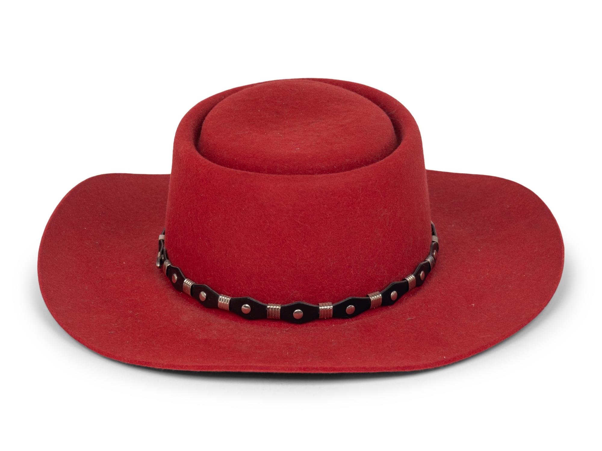 A Felted Hat with Metal Accents