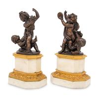 A Pair of French Gilt and Patinated Bronze and Marble Ornaments