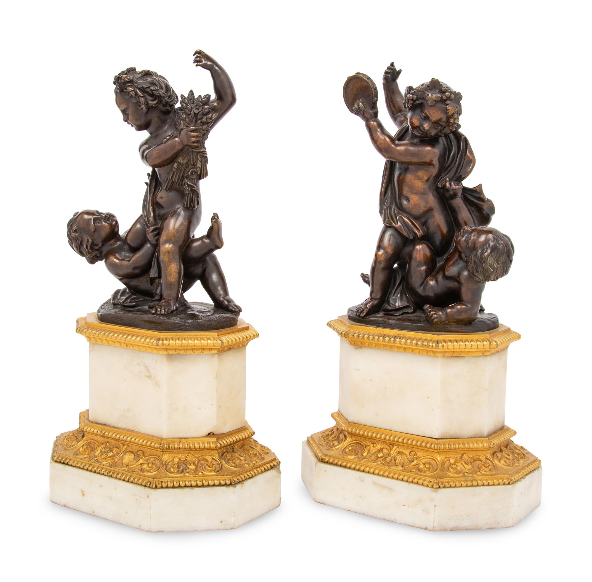 A Pair of French Gilt and Patinated Bronze and Marble Ornaments