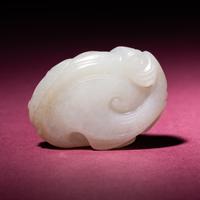A Small Chinese Russet and Jade 'Bat and Lingzhi' Carving, 18th/19th Century — 清中期 白玉留皮靈芝福壽佩