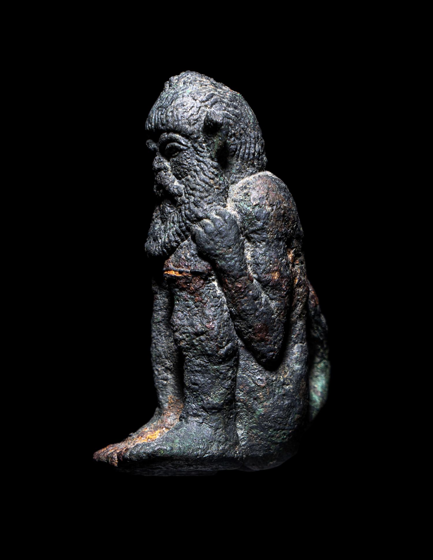 A Greek Bronze Satyr
